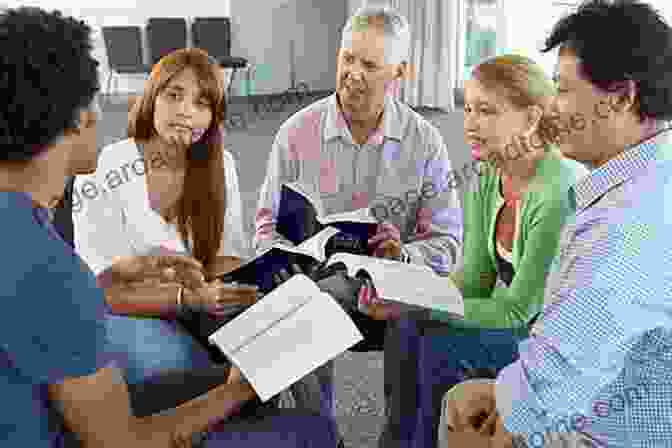 A Pastor Teaching A Group Of People Using A Bible And A Book The Moody Handbook Of Theology