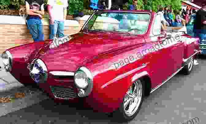 A Sleek 1950s Convertible With A Vibrant Red Exterior And Gleaming Chrome Accents. Classic Cars: With 100 Automobile Photos