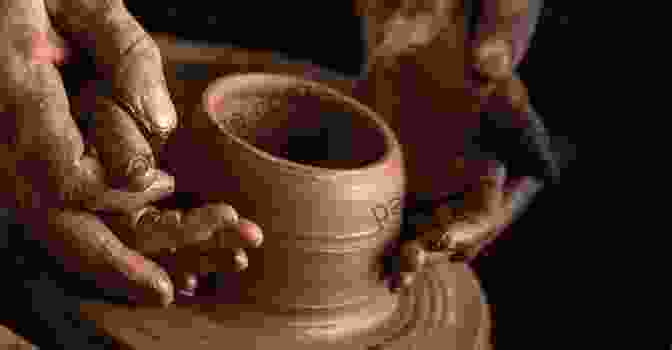 Image Of A Potter Working On A Clay Vessel DIY POTTERY GUIDE FOR BEGINNERS: Practical Guide To Start Pottery Work The First Steps For Beginners