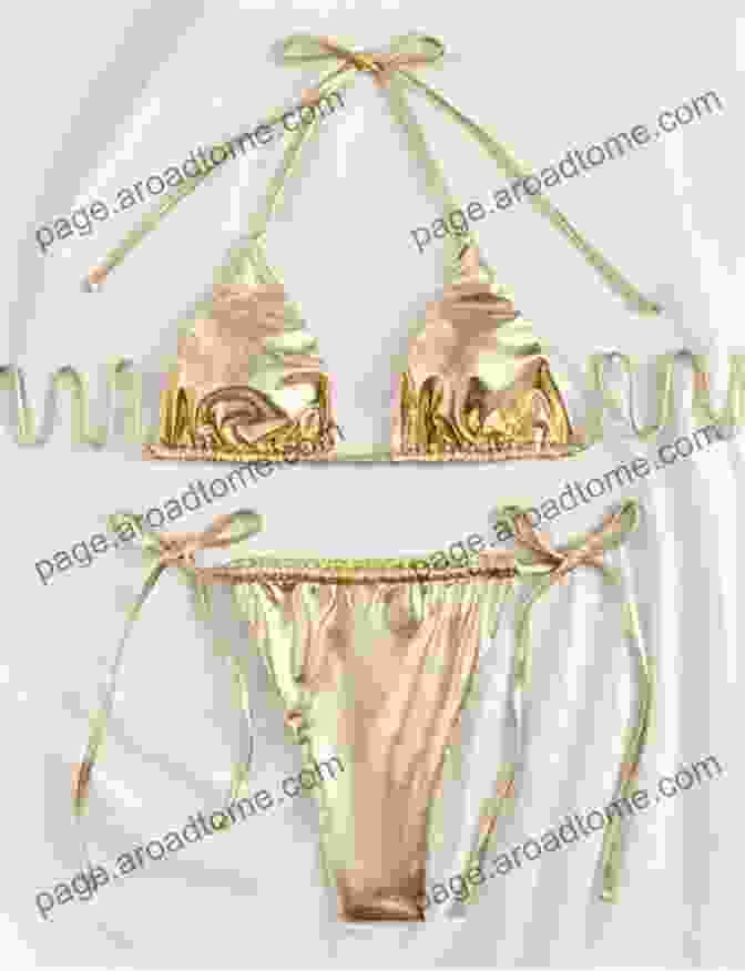 Model Striking A Pose In A Metallic Gold Bikini With Intricate Beading. Luli Fama Swim 2024 Lookbook Volume 17