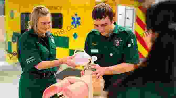 Paramedics Practicing Their Clinical Skills On A Simulation Mannequin During Their Training The Field Medics Workbook: A Proven Approach For Training Paramedics