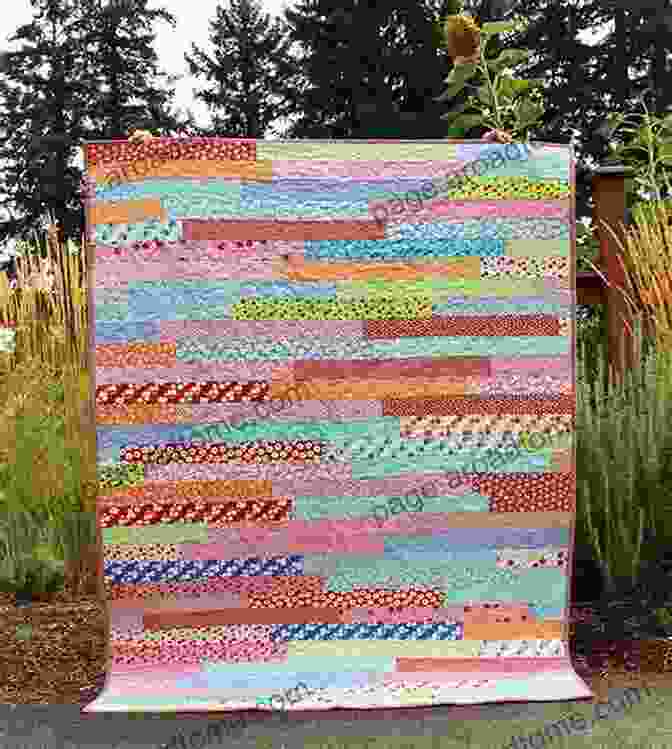 Quilting Book With Vibrant Jelly Roll Fabrics And A Finished Quilt Jelly Roll Inspirations: A Step By Step Guide To Making 12 Winning Jelly Roll Quilts